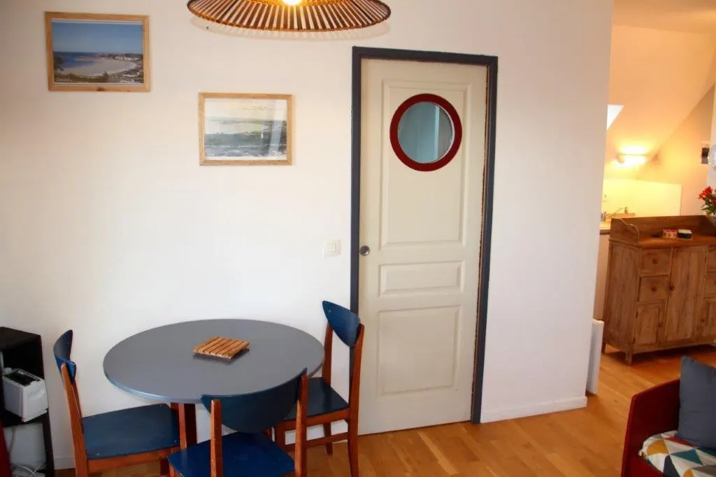 Dining nook with porthole door