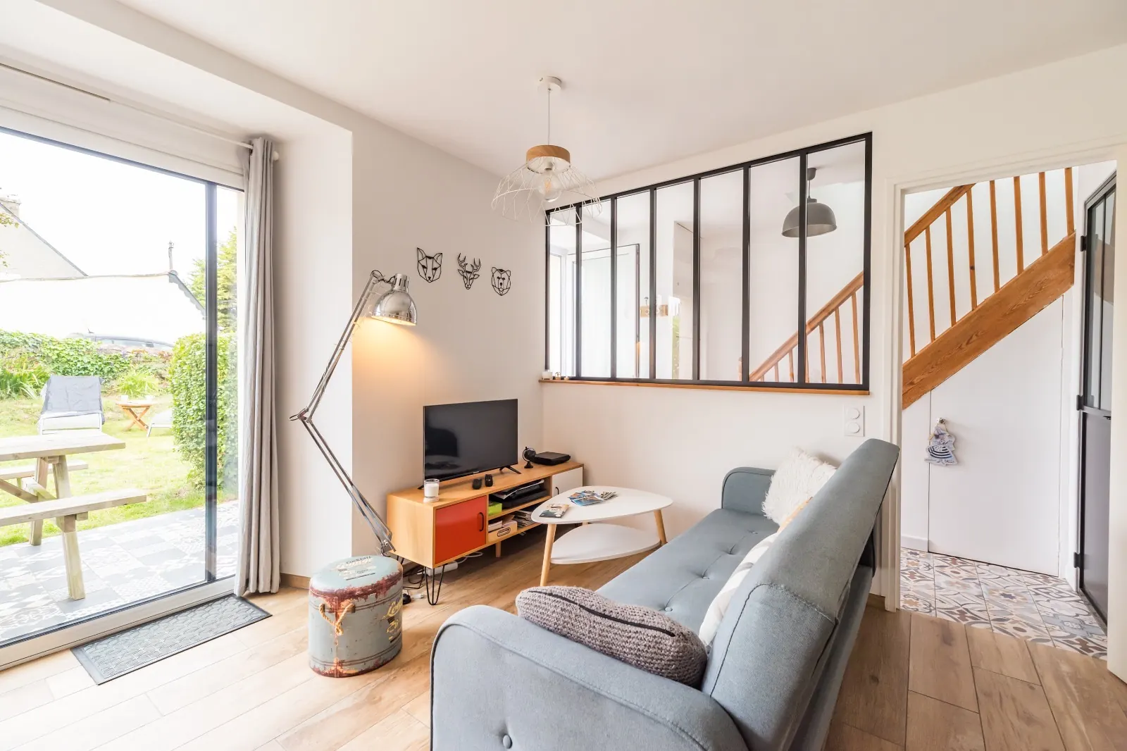 Bright living room with glass partition