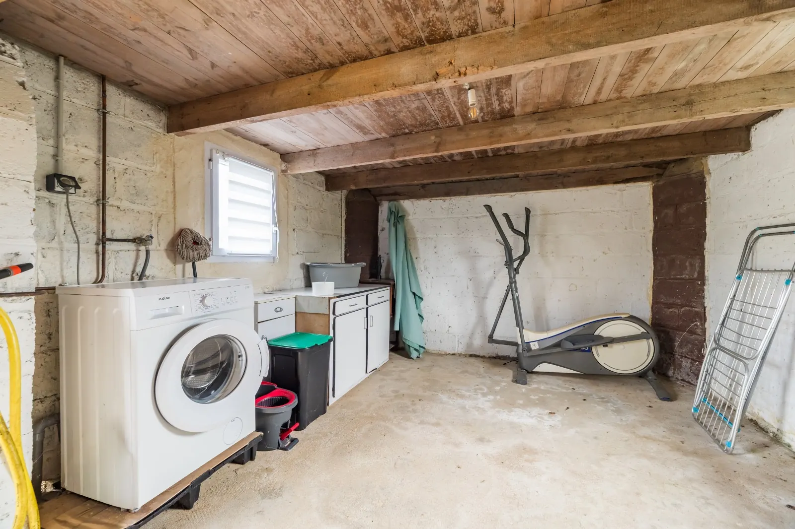 Laundry room with washing machine in the outbuilding